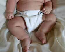 baby wearing Cloth Diapers