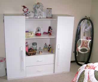 A Dresser along with a free standing mirror