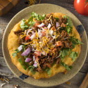 This easy Indian Fry Bread Recipe makes a delicious fry bread that can be used to make Navajo Tacos, also called Indian Tacos. We like to make the tacos, but sometimes the kids just like to eat the fry bread with honey. Either way they are delicious!