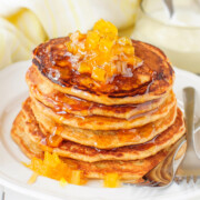 This pumpkin maple syrup recipe makes a tasty syrup perfect for adding the delicious flavor of fall! With the perfect blend of maple syrup, pumpkin pie spice, and real pumpkin, it makes an ideal topping for pumpkin pancakes. For a subtle touch of fall, drizzle it over regular pancakes too!
